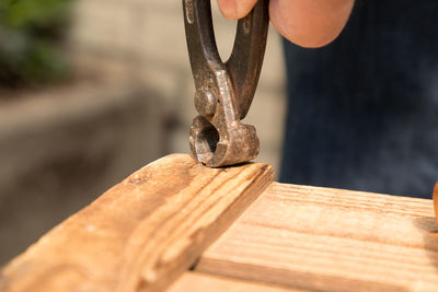 Close-up of carpenter working on wood