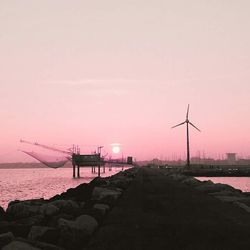 Scenic view of sea at sunset