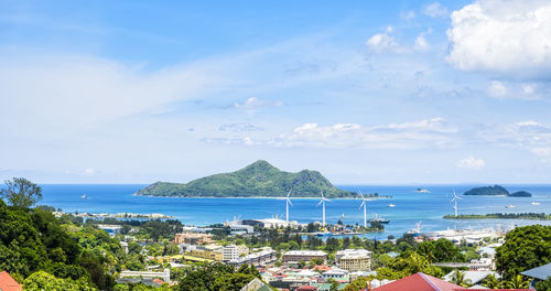 Victoria's port, seychelles, with a view of st anne island with blue sky and clean ocean water