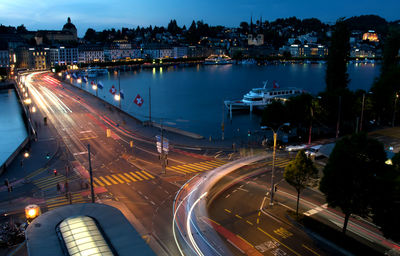 High angle view of light trails on road at night