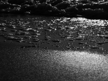 Close-up of water in sea against sky