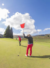 Senior couple on golf course