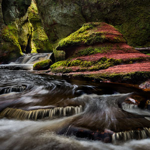 Stream flowing through rocks