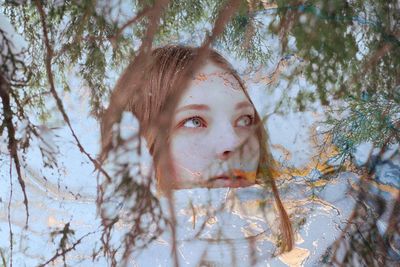 Portrait of girl in tree