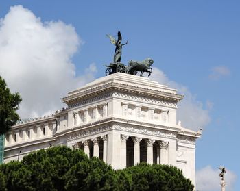 Low angle view of altare della patria against sky