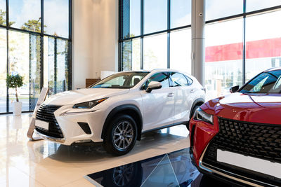 Close-up of car in showroom