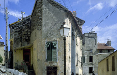 Low angle view of old building against sky