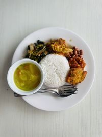 High angle view of food in plate on table