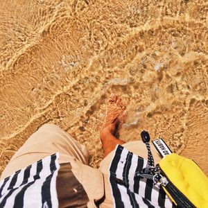 Low section of person on beach