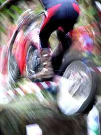 Blurred motion of man riding