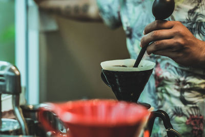 Man prepared coffee drip,barista making coffee