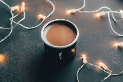 Close-up of coffee cup on table