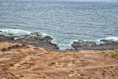 High angle view of rocks on beach