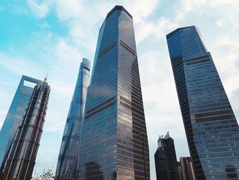 Low angle view of modern buildings against sky