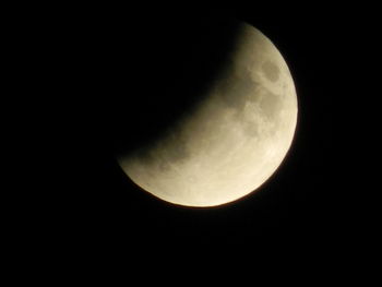 Low angle view of moon against sky at night