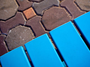 Blue table on concrete block floor