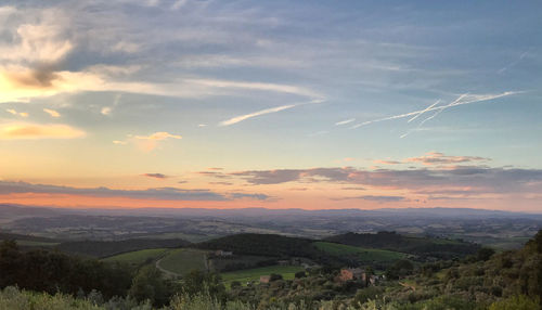 Scenic view of landscape against sky during sunset