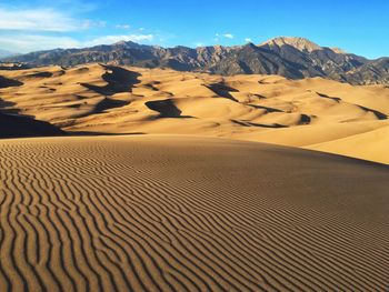 Scenic view of desert against sky