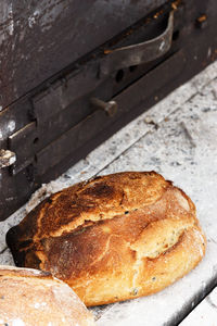 High angle view of bread on cutting board