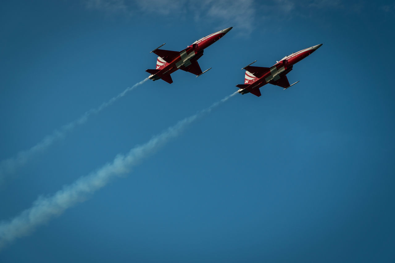 LOW ANGLE VIEW OF AIRSHOW IN SKY