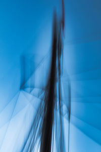 Blurred motion of blue wall