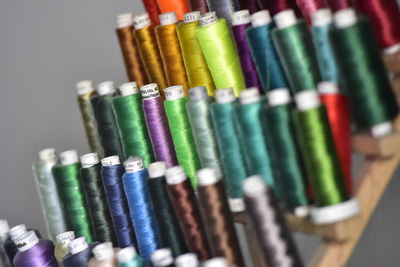 High angle view of multi colored pencils in container