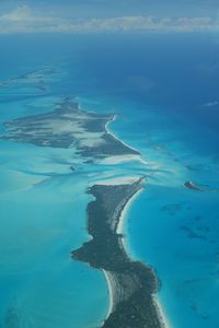 Aerial view of lake against blue sky