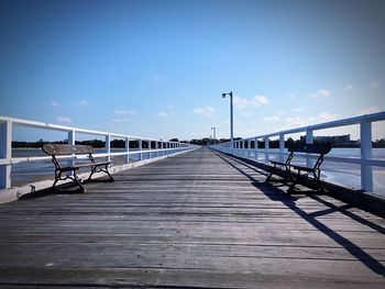 Pier over sea against sky