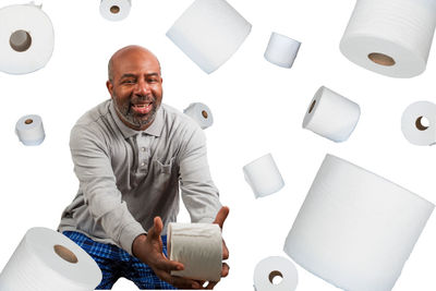 Portrait of smiling man sitting on seat