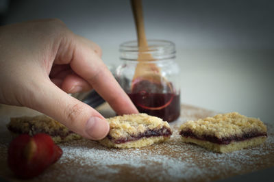 Close-up of person preparing food