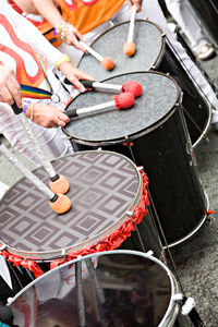 High angle view of people playing drum