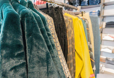 Close-up of warm clothing in store