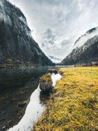 Scenic view of snowcapped mountains against sky