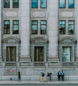 People in front of building