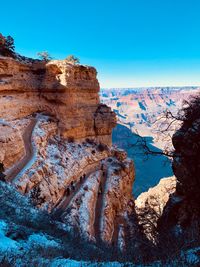 Rock formations against blue sky