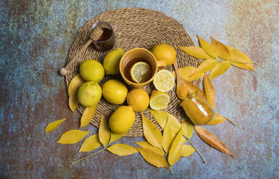 High angle view of fruits in basket on table