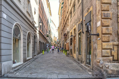 People walking on street in city