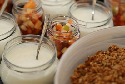 High angle view of yogurts and pickles