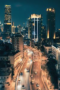 High angle view of illuminated city street at night