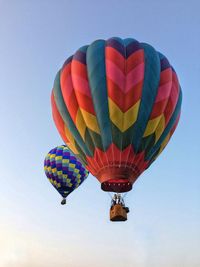 Low angle view of hot air balloon against clear sky