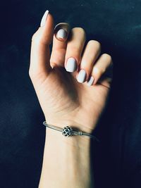 Close-up of woman hand wearing bracelet