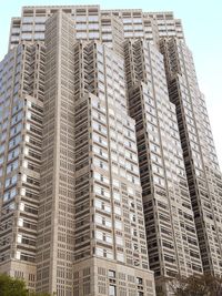 Low angle view of modern buildings against sky