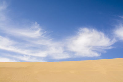 Scenic view of desert against sky