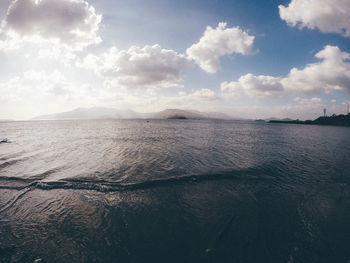 Scenic view of sea against cloudy sky