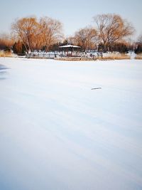 Scenic view of frozen lake against sky