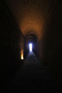 Illuminated corridor of building