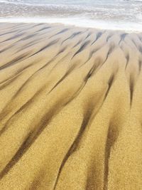 Full frame shot of sand at beach