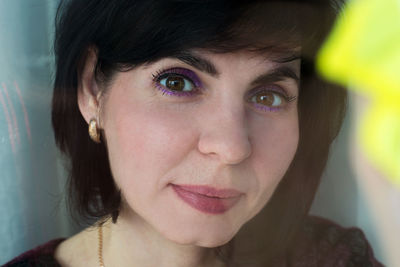 Close-up portrait of woman