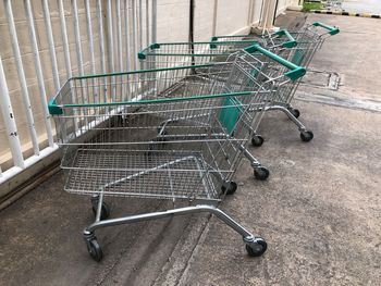 Side view of an abandoned shopping cart