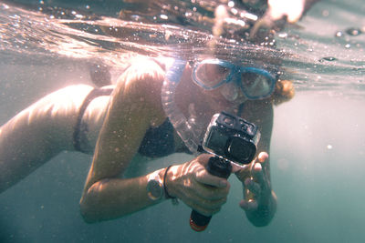 Man swimming in sea